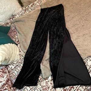Black velvet flair pants with a side slit on the legs. only worn once.